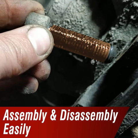 Applying Keze Copper Anti Seize Thread Lubricant Grease on bolt for automotive use, prevents rust and corrosion.