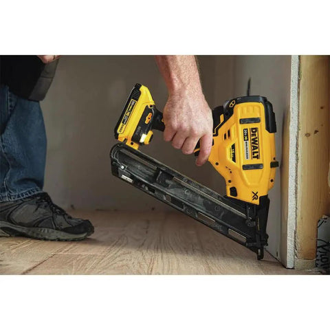Cordless 15 Gauge Angled Finish Nailer 20V Max XR Renewed for trim molding installation against a wall