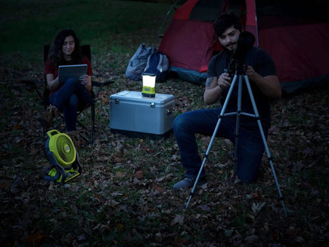 Cordless 18V Hybrid Whisper Series 7.5 Inch Fan Tool Only Bare Tool for Lawn Care Pros beside camping setup at night