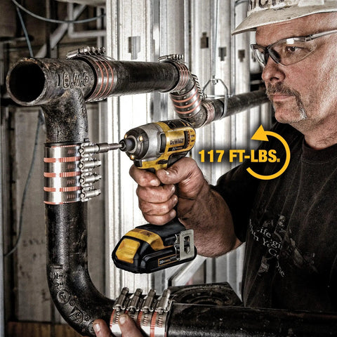 Worker using 20V Max Cordless Drill And Impact Driver Combo Kit With Two Batteries And Charger on pipe installation job