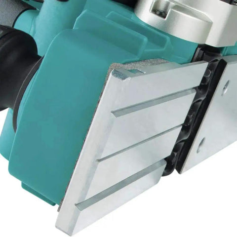 Close-up of Cordless 18V LXT Brushless 3-1/4 Inch Planer with AWS showing metal blades and dust extraction feature.