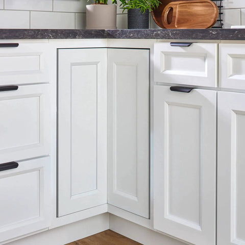 Kitchen view with corner base cabinet closed, compatible with Pie-Cut Dual Tier Lazy Susan Organizer for Corner Base Cabinets in White Polymer