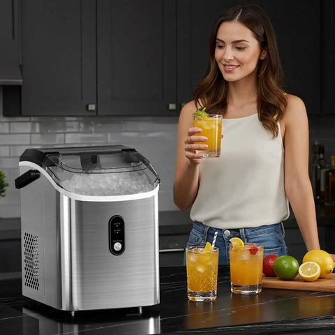 Compact countertop nugget ice maker delivers soft, chewable ice in a 10-minute batch, producing up to 34 lb per day, shown in kitchen.