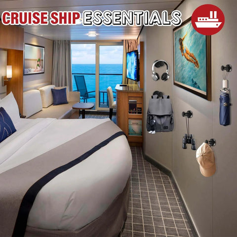 Cruise ship cabin with essential travel gear including headphones, backpack, umbrella, and binoculars displayed on hooks.