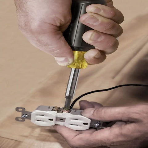 Person using 11 In 1 Screwdriver And Nut Driver Set With 8 Bits Including Phillips Slotted Torx And Square, Cushion Grip Handle on outlet