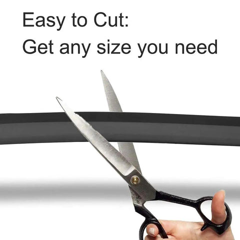 Scissors cutting Magnetic Boundary Strips For Robotic Vacuum Cleaners, 13 Feet Of Tape Markers To Create No Go Zones.