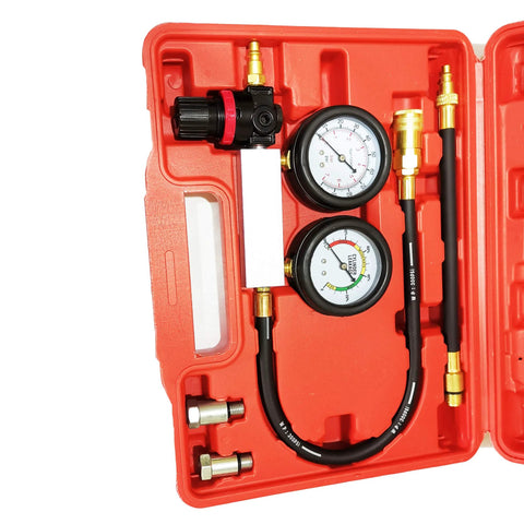 Engine cylinder leak-down tester kit in red case with dual gauges, hoses and brass adapters.