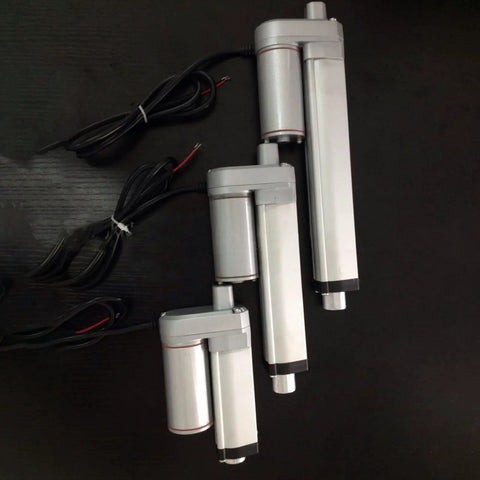 Three 24V DC Linear Actuators With 50mm Stroke 750N Lift IP65 Aluminum Housing showing different sizes, on black background.
