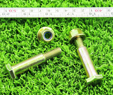 Two Pack Deck Wheel Shoulder Bolts And Flanged Locknut Kit For Half Inch Bore Wheels on grass with measuring tape.