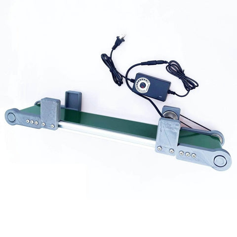 Desktop Belt Conveyor With Stepless Speed Control for Packaging Factories and Assembly Lines, green and gray compact lab equipment.