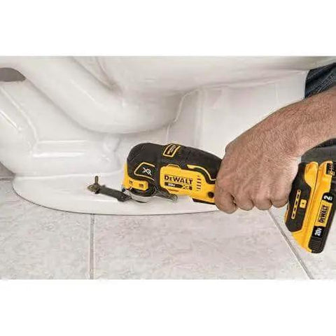 Using DEWALT 20V MAX XR Cordless Oscillating Multi Tool with Brushless Motor to cut tile near toilet base