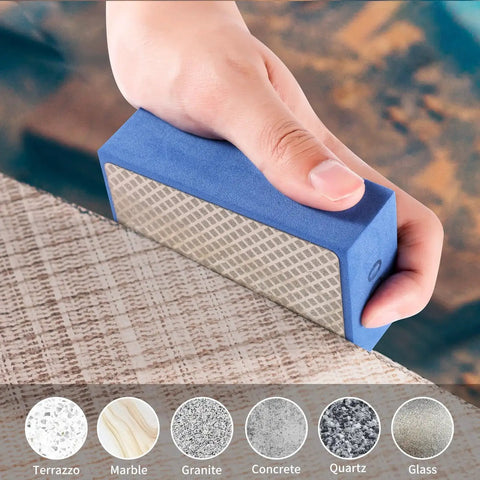 Hand using Six Piece Diamond Hand Polishing Pads Set 60 To 1000 Grit for tile, demonstrating polishing capability on various surfaces.