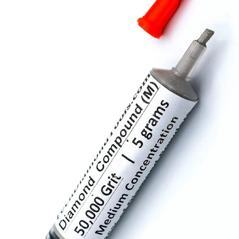 Oil based diamond polishing paste with 50,000 grit and 25 percent diamond powder in a syringe, medium concentration.