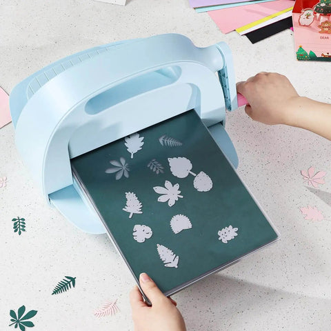 No Fuss Die Cutting And Embossing Machine With An 8.5 Inch Opening for card making and scrapbooking, showing die cuts in action, OFFNOVA.