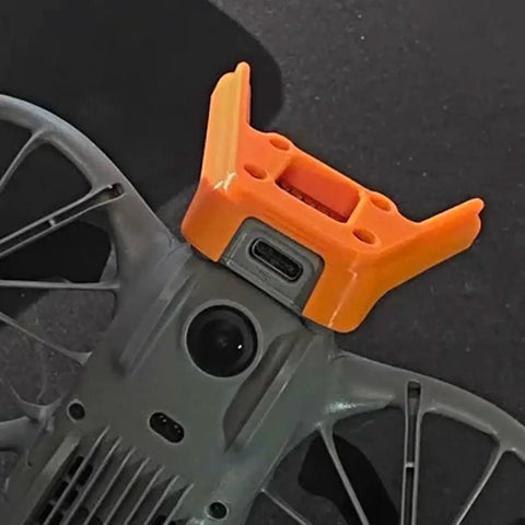 DJI Neo 2 Antenna Protective Cover Orange Rugged Precision Fit Drone Accessory With Snap On Installation For Enhanced Antenna Protection Weatherproof Shield Safe Flights In Harsh Environments installed on drone
