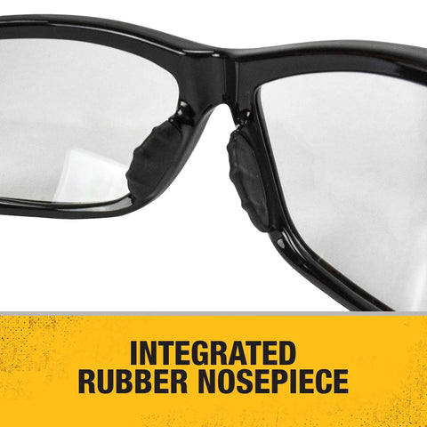 Close-up of Dominator Z87 Plus Safety Glasses with black full frame, clear lenses, and integrated rubber nosepiece.
