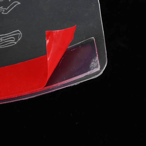 Close-up of 47.2 Inch Roll Door Pinch Guard Safety Stopper, anti slam protector, red adhesive tape for easy installation.