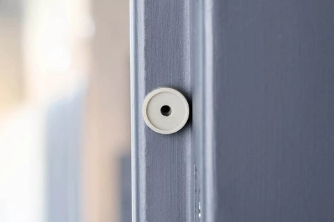 Close-up of Heavy Duty Commercial Door Silencer Kit For Metal Frames Replacement Absorbs Shock And Cuts Noise 12 Pack
