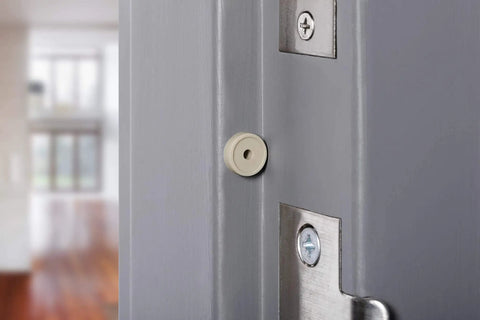 Close-up of Heavy Duty Commercial Door Silencer Kit For Metal Frames Replacement Absorbs Shock And Cuts Noise 12 Pack installed on door