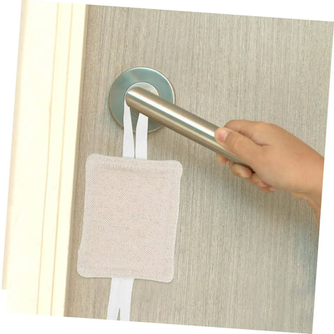 Three Pack Door Slam Stoppers Silencers for Doors Prevent Slamming with Easy No Drill Installation Attach to Door Knobs Without Tools Safe for Kids and Bedrooms in use on a doorknob.