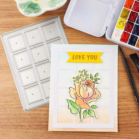 Dotted Square Frame Cutting Die Set for Card Making and Scrapbooking beside a decorated love card with floral design