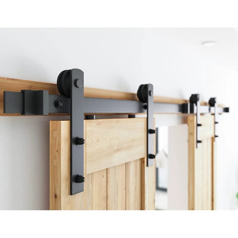 8FT Double Barn Door Hardware Kit for Two 24 Inch Door Panels with carbon steel sliding track and nylon rollers, installed view.