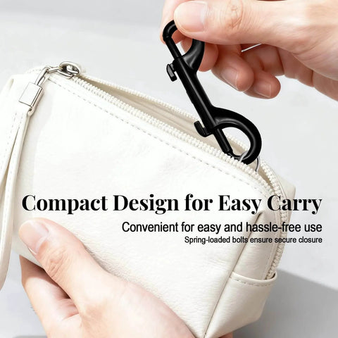 Hands using Heavy Duty Double Ended Snap Hooks 3.5 Inch Zinc Alloy Trigger Clips With Stainless Steel Spring 110 Lb Load for easy carry on bag.