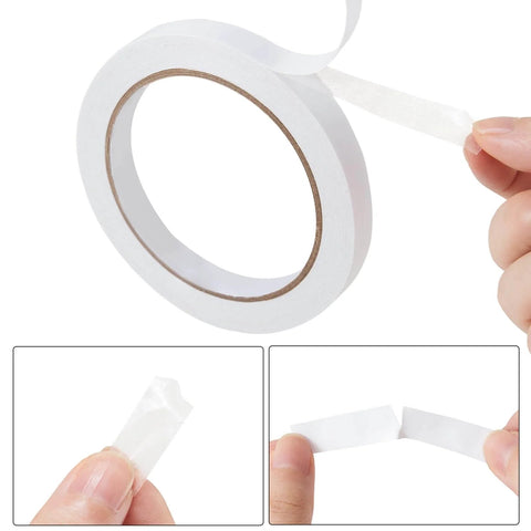 Two Rolls Of One Quarter Inch Six Millimeter Double Sided Adhesive Tape For Arts And Crafts Scrapbooking Card Making Gift Wrapping DIY Projects Photography And Office School Supplies Easy To Peel Yet Strong Hold And Removable By Hand shown in close-up