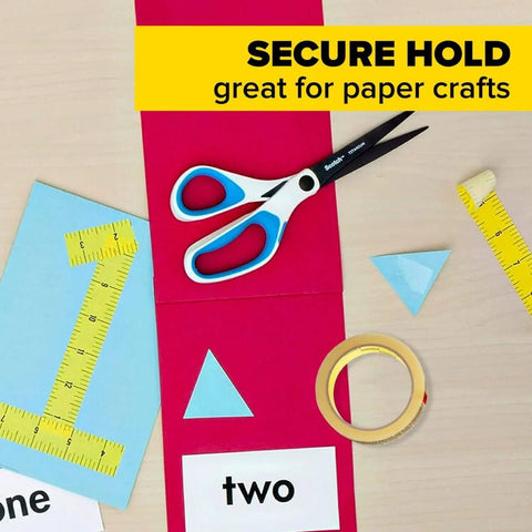 Double Sided Tape For Gift Wrapping And Crafts, 0.50 Inch By 1296 Inch Roll, Two Refill Rolls on a craft table with scissors and decorations.