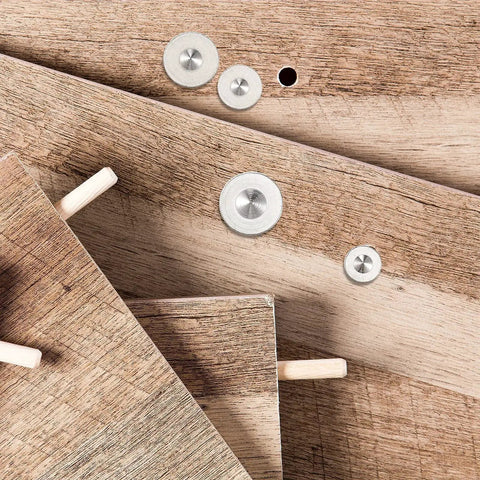Wood panels with dowels and Dowel And Tenon Center Transfer Plugs For Dowel Centers And Doweling Pins Twenty Piece Drill Hole Tool Set.