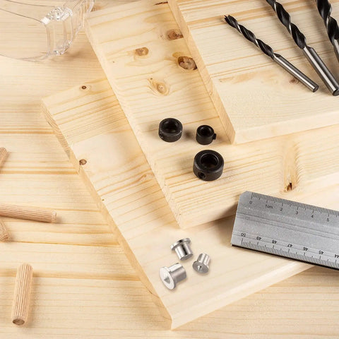 Dowel And Tenon Center Transfer Plugs For Dowel Centers And Doweling Pins Twenty Piece Drill Hole Tool Set on wood with ruler
