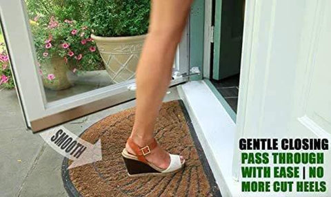Woman stepping through door with Smooth - Dual Door Closer System - Heavy Duty for storm and security doors installed on white door
