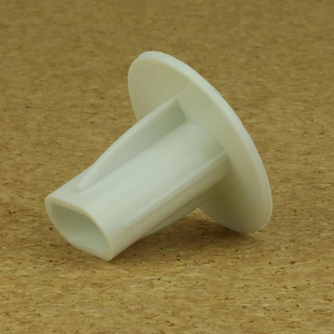 Skywalker dual feed-through cable bushing, white plastic with flange and hollow cylindrical body.