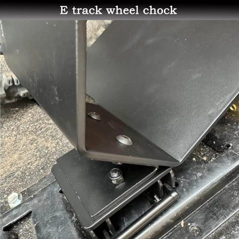 Close-up of 2 Pack E Track Wheel Chocks For Motorcycles And Dirt Bikes, Fits Tires Up To 6 Inches, installed on E-Track system.