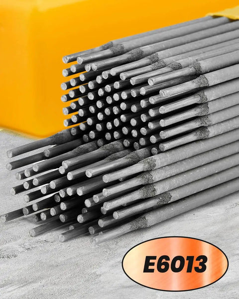 E6013 Welding Rod 3/32 Inch 5 Pound Carbon Steel Stick Electrodes For AC And DC Welding, stacked metal rods on concrete surface