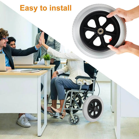 Hands holding 12 inch solid spoked wheelchair replacement wheel showing easy installation, with wheelchair in an office setting, 2 Pack 12 Inch Solid Plastic Spoked Wheelchair Replacement Wheels with Hard Rubber Tires, 0.5 Inch Shaft Aperture and 2.17 Inch Spacing, Durable Mobility Wheels for Manual Wheelchairs, Walkers and Rollators.