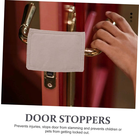 Soft door silencers and closers with elastic straps on door handle preventing slamming and finger injuries. Protects surfaces.