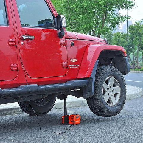 Red SUV lifted by Electric Car Jack Kit With Hydraulic Lift And Dual Power Mode, Bright LED Light, And Built In Tire Inflation