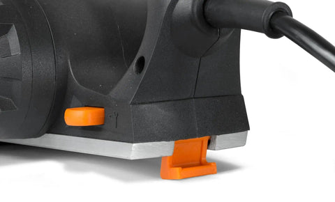 Close-up of the Powerful 3.8 Amp Electric Hand Planer with a 2-3/8 inch width showing the depth adjustment feature and power cord.