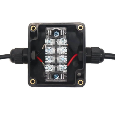 Interior view of Watertight Junction Box IP67 Electrical Enclosure Built Like A Tank with 12-position terminal block and cable glands.