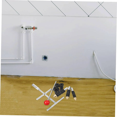 Emergency Water Stopper Kit for Plumbing Tools with copper and stainless steel parts displayed on wood surface