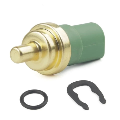 Schusspart TS477 engine coolant temperature sensor with green plastic body and brass tip, shown with black O-ring and retaining clip