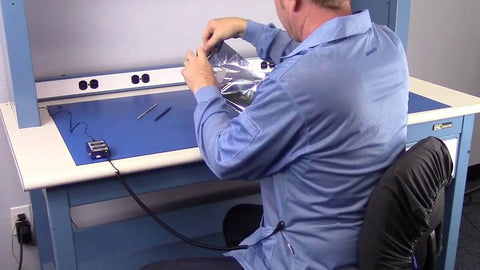 Technician wearing Level 3 ESD Lab Jacket For Cleanrooms And Electronics Work Light Blue 4XL Anti Static Full Sleeve Coat