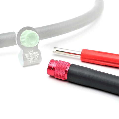AutoLine Pro EVAP service port adapter kit components: red aluminum knurled adapter, black hose, red tool.