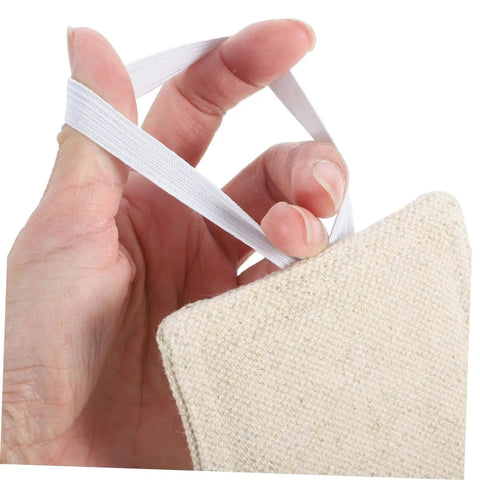 Hand holding soft, tool-free door silencers cushion every slam, preventing accidental lockouts with quiet, no-hole installation