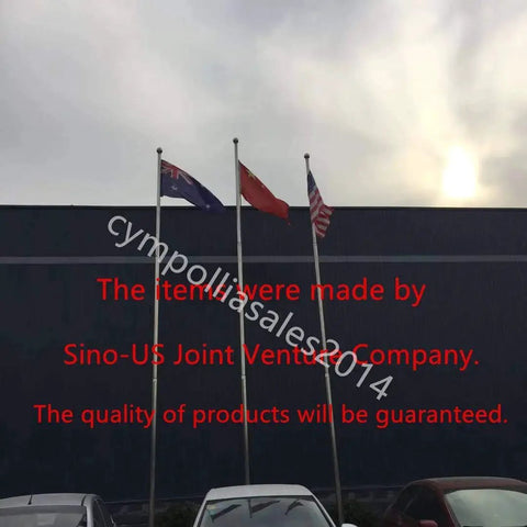Building with flags and text about Sino-US Joint Venture Company quality guarantee.