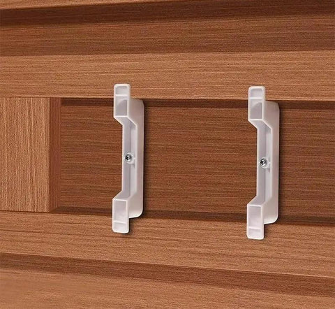 Set Of 10 False Front Cabinet Clips With Screws For Four And A Half Inch Drawer Fronts installed on a wooden cabinet surface.