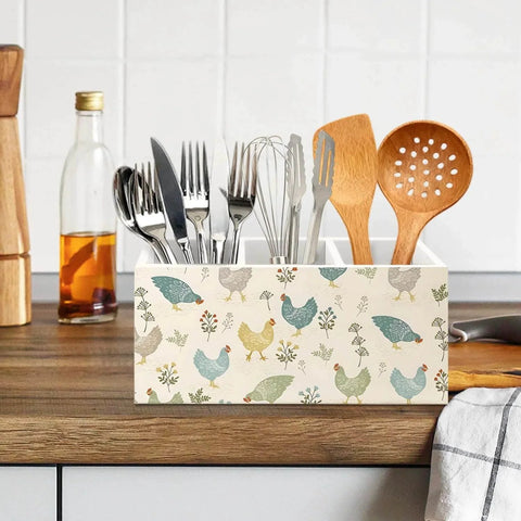 Farmhouse Chicken Wooden Utensils Holder on kitchen counter, decorated with chicken prints, holding cutlery and utensils