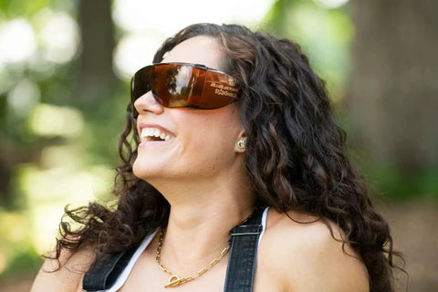 Woman wearing StarShield Fit Over Sunglasses With Lenses And Blue Light Blocking UV Protection outdoors