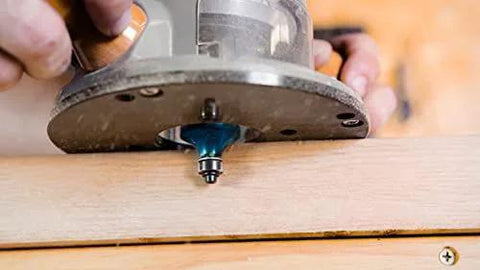 Fixed Base Router 2.25 HP 12 Amp Variable Speed 8000 to 25000 RPM used for precise edge work on wood surface.